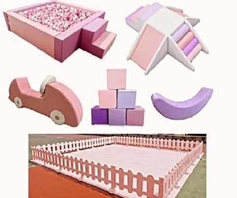 Collection of soft foam play structures for children including ball pit, blocks, car, rocker, and outdoor pen